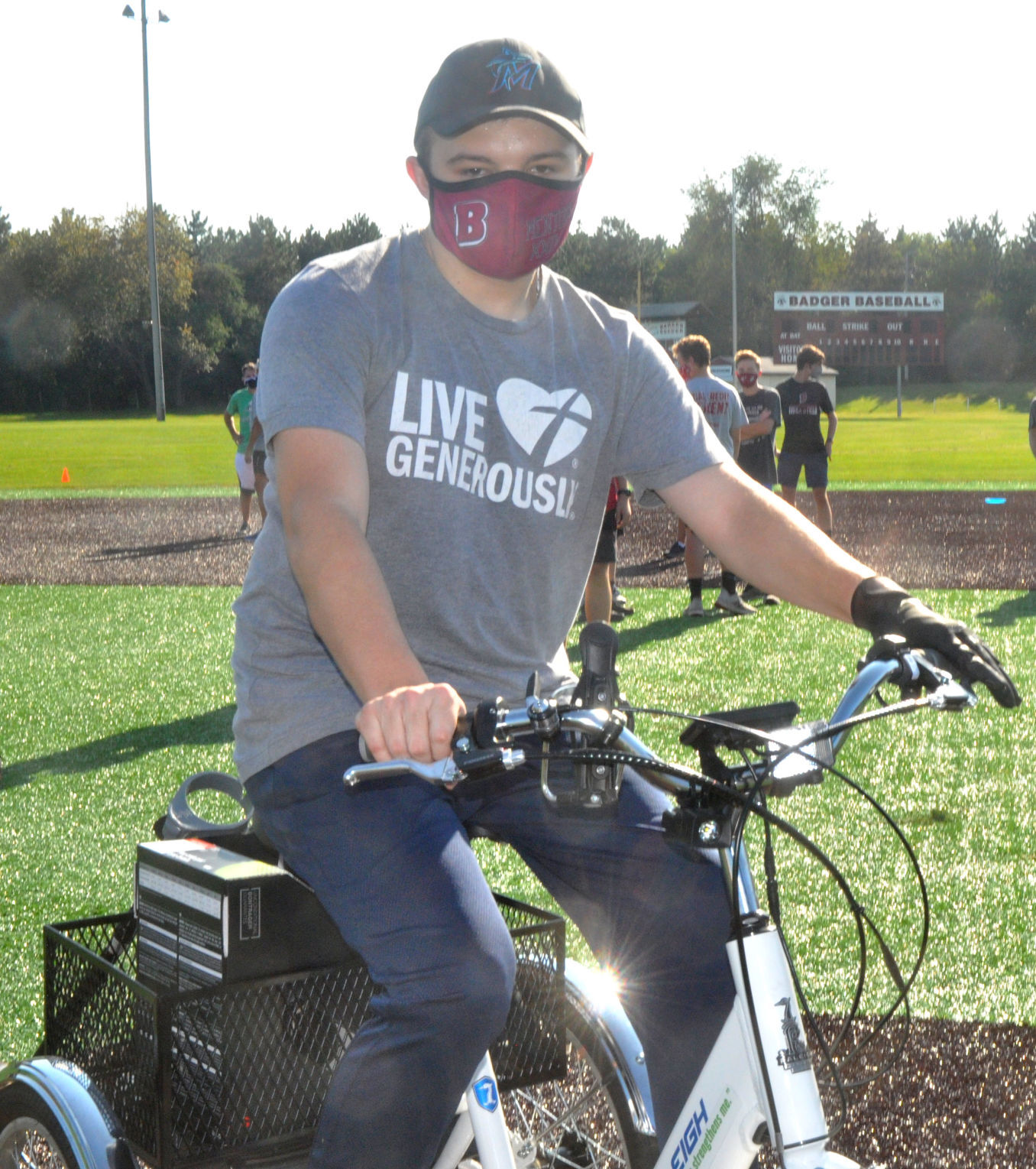 Badger High School student Brooks Guif tries out the new electric bike